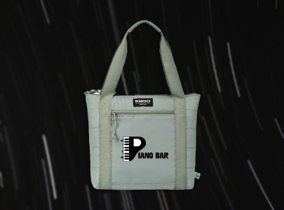 Silver, Heavy Weight, Igloo Bag with Handles and a Gloss Finish decorated with Piano Bar logo for Nashville, TN